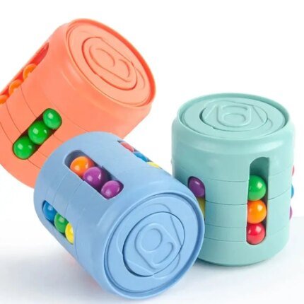 Fidget spinner med färgglada ”beans”. Stress- och fidgetleksak för barn och vuxna.