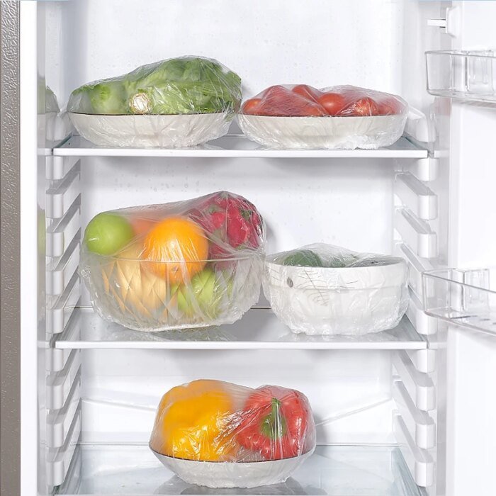 Återanvändbara/engångs matlock i plast, plastfolie-överdrag med elastisk kant - Bild 4