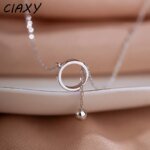 Geometriskt Silverfärgat Halsband med Cirkelhänge och Tofs - Bild 2