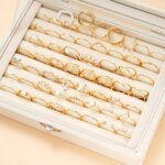 Set med 58 st Vintage-ringar – Hjärtan, ormar och fjärilar i guldton - Bild 3