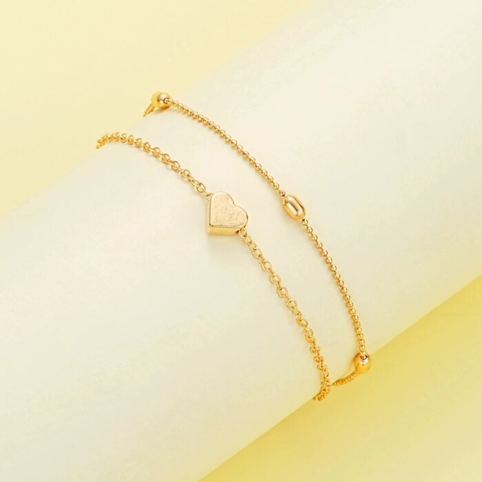 Modernt Smyckesset med Hjärta och Imitationspärlor – Halsband och Armband i Guld- eller Silverfärg för Dam - Bild 4