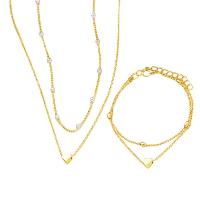 Modernt Smyckesset med Hjärta och Imitationspärlor – Halsband och Armband i Guld- eller Silverfärg för Dam - Bild 5