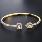 Lyxigt Geometriskt Guldtonat Armring för Kvinnor, Cubic Zirconia Armband i Modern Design för Fest och Vardag