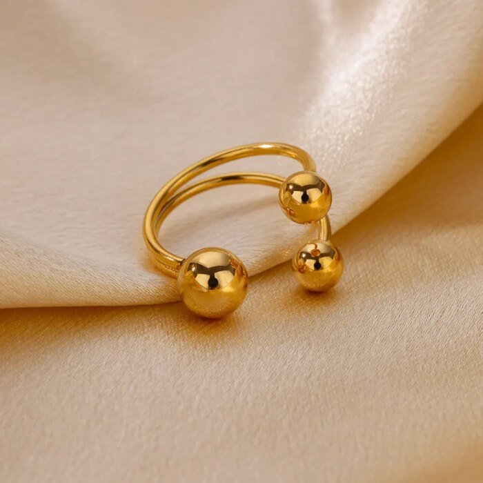 Dubbelt ring-set i rostfritt stål med pärldetaljer – Guldbelagd, geometrisk och justerbar design - Bild 3