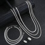 Enkelt smyckesset i rostfritt stål – Stilrent silverfärgat set med ring, halsband och armband för herr och unisex