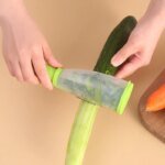 Multifunktionell fruktskalare med inbyggd behållare för enkel och ren hantering - Bild 3