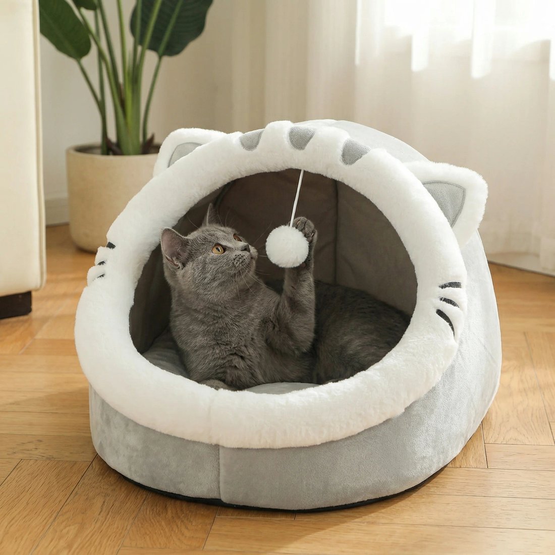Söt och mjuk kattsäng med mysig grottdesign för djup sömn