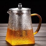 Hammarmönstrad glastekanna med rostfritt filter för pu'er-te