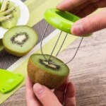 Kreativ kiwiskalare och fruktskärare för köket