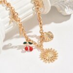 Chunky kedjehalsband i Y2K-stil – Hammrad sol med berlocker - Bild 5