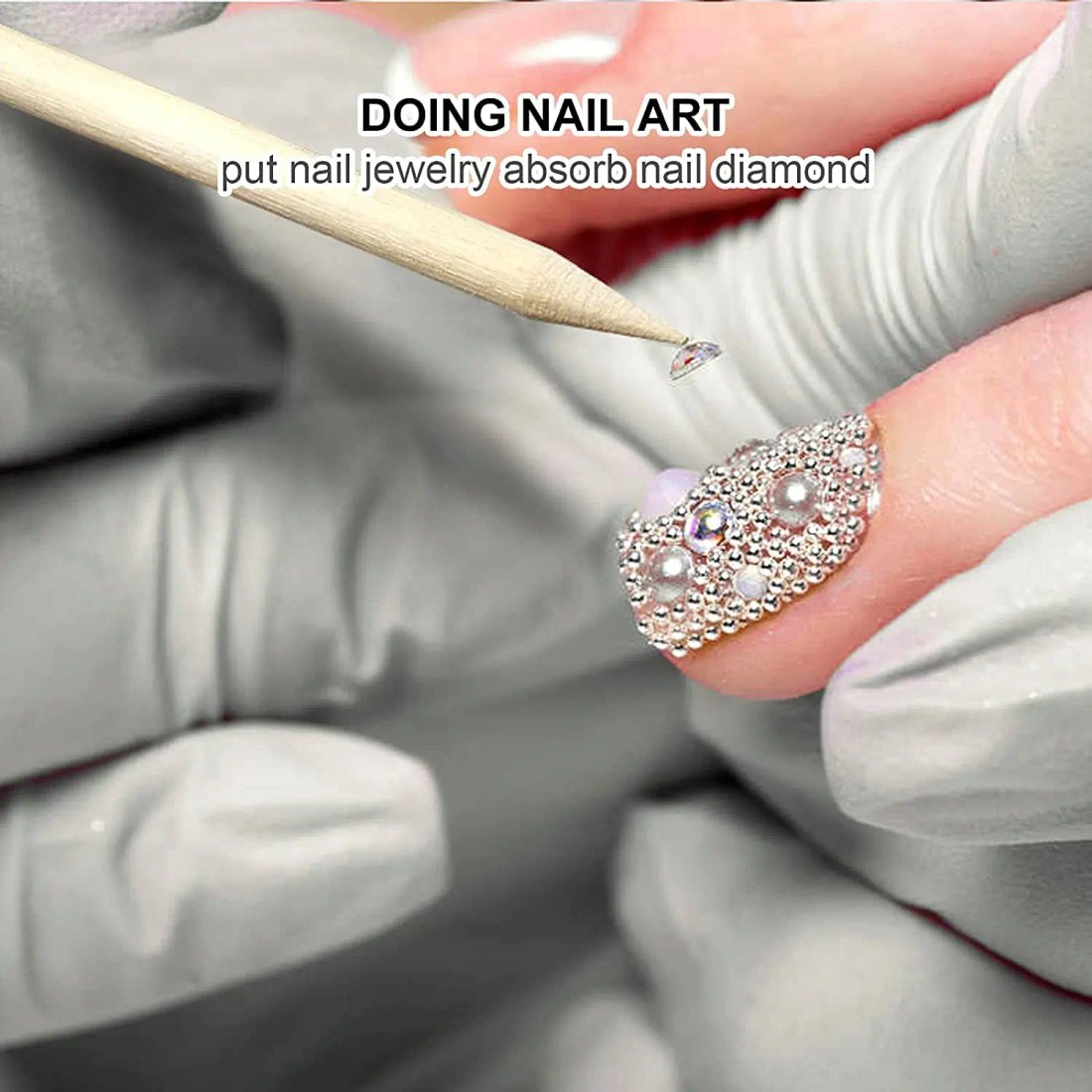 Manikyrpinnar i apelsinträ för nagelband och nageldekorationer