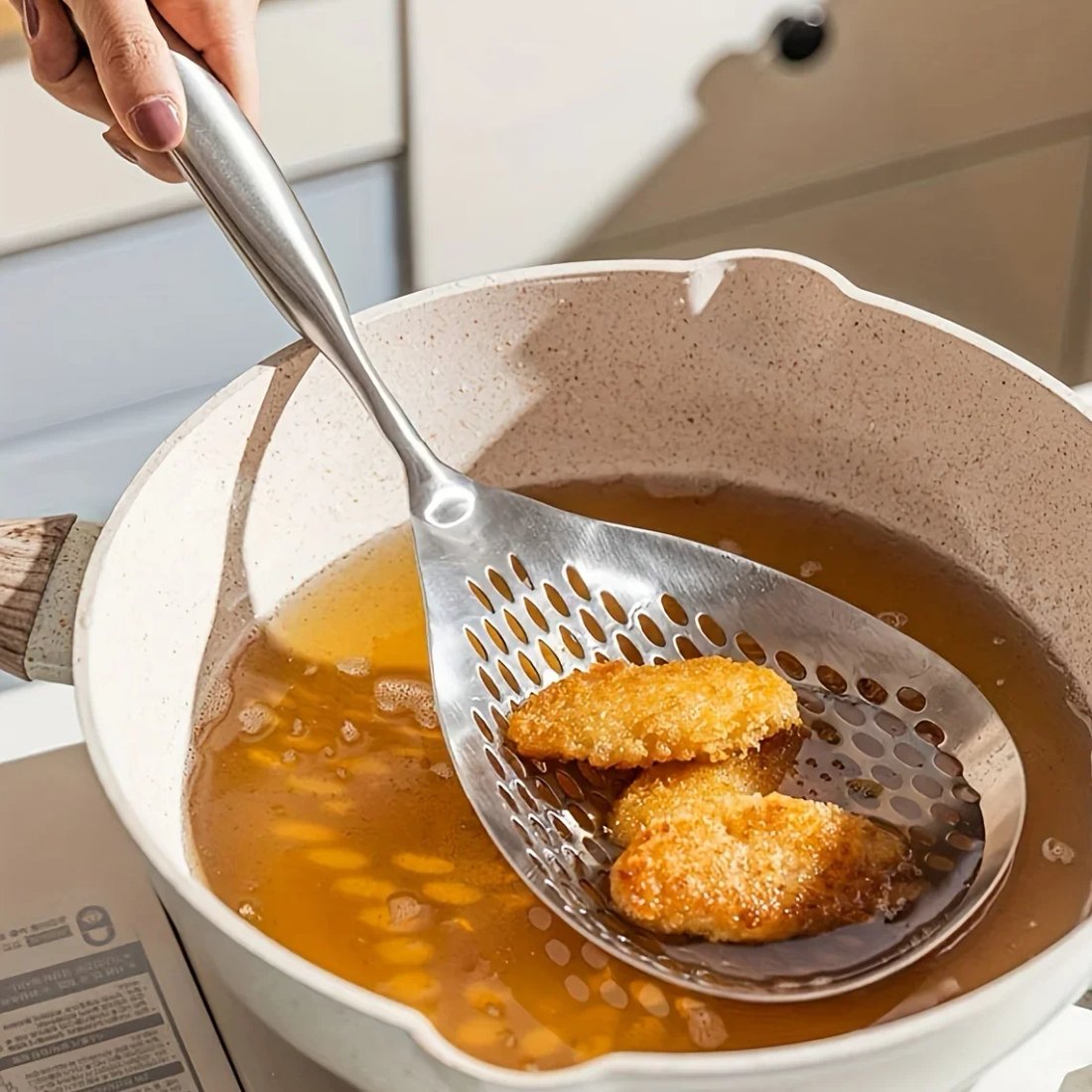 Silsked i rostfritt stål med trähandtag