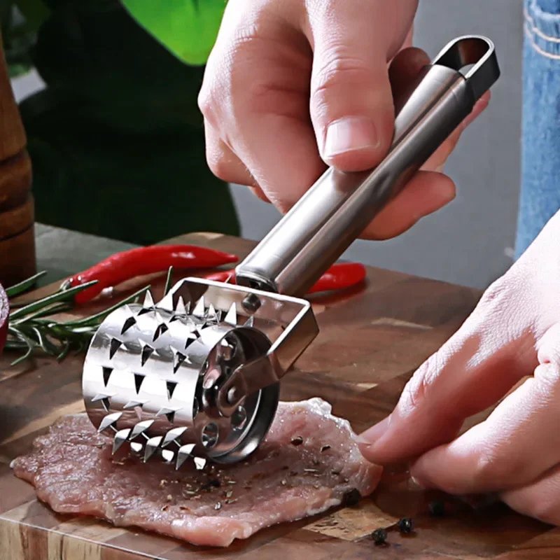 1300528-zs8wlb.jpg Köttmörare i rostfritt stål med kavelmodell - Bild 1