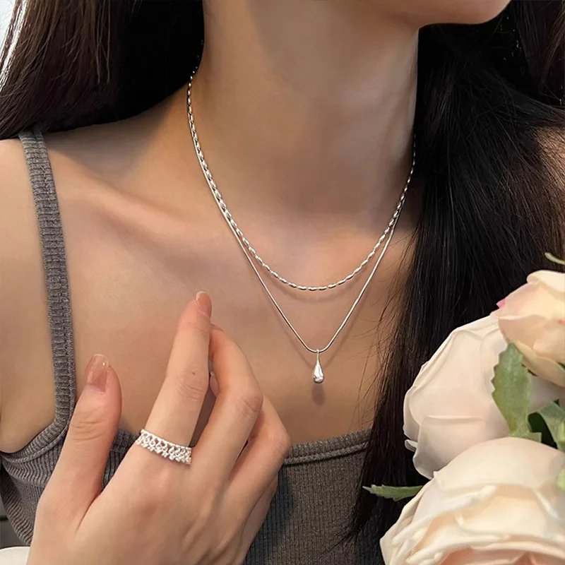 Exklusivt dubbelhalsband i 925 silver med hänge