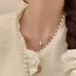 Stjärnhalsband i 925 silver med minimalistiskt hänge