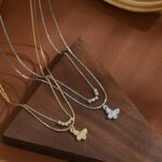 Exklusivt dubbelkedjigt fjärilshalsband i 925 sterling silver