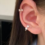 Eleganta örhängen i 925 sterlingsilver med rosett