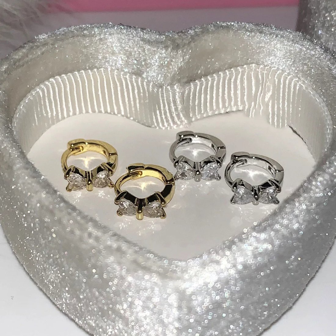 Eleganta örhängen i 925 sterlingsilver med rosett