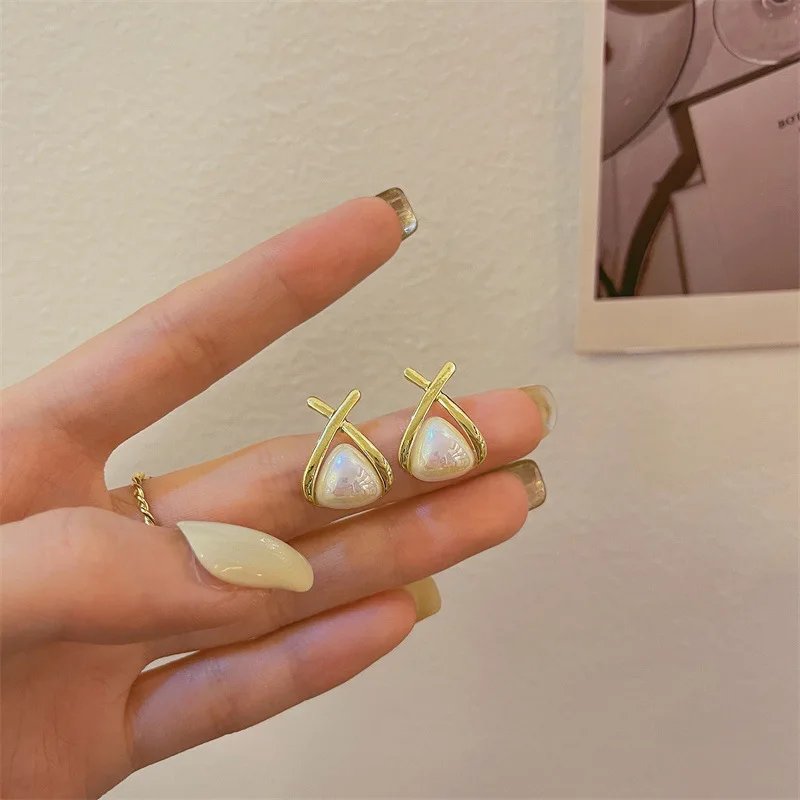 Geometriska örhängen i 925 sterlingsilver med pärla