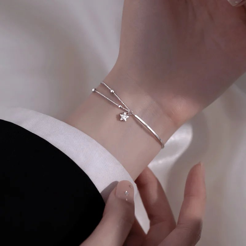 Dubbelt silverarmband med stjärna i 925 silver
