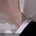 Dubbelt silverarmband med stjärna i 925 silver