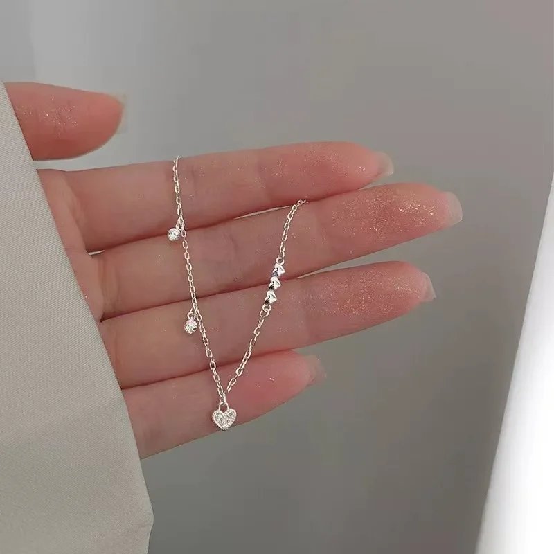 Hjärtformat silverarmband med glittrande zirkon