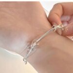 Silverarmband med rosett och geometrisk form i 925 silver