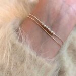Dubbelradigt silverarmband med runda pärlor i 925 silver